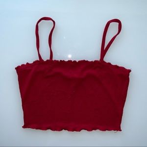 Red straight neck top with lettuce trim